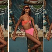 a model wears a tropic of c high waisted swimsuit to illustrate a roundup of the best high waisted swimsuits 2022